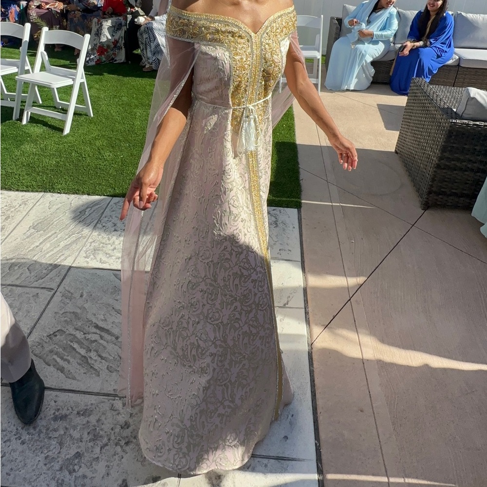 Beautiful gown with stunning details and mesh open sleeves - worn once